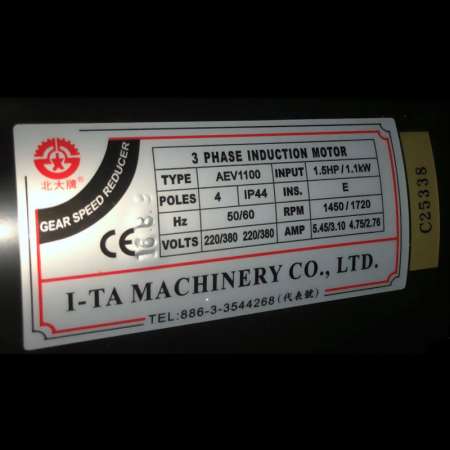 I-TA Magazine ATC Change Motor AEV1100, front view with green shaft and safety warning label